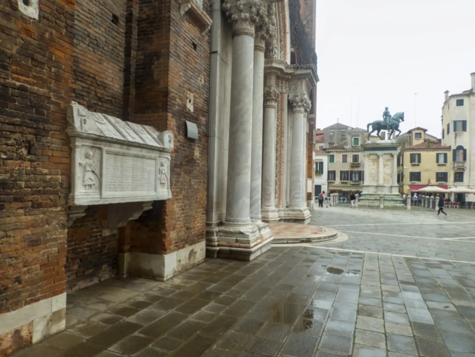 The white marble tomb of Jacopo Tiepolo on the façade of the Basilica SS Giovanni e Paolo.